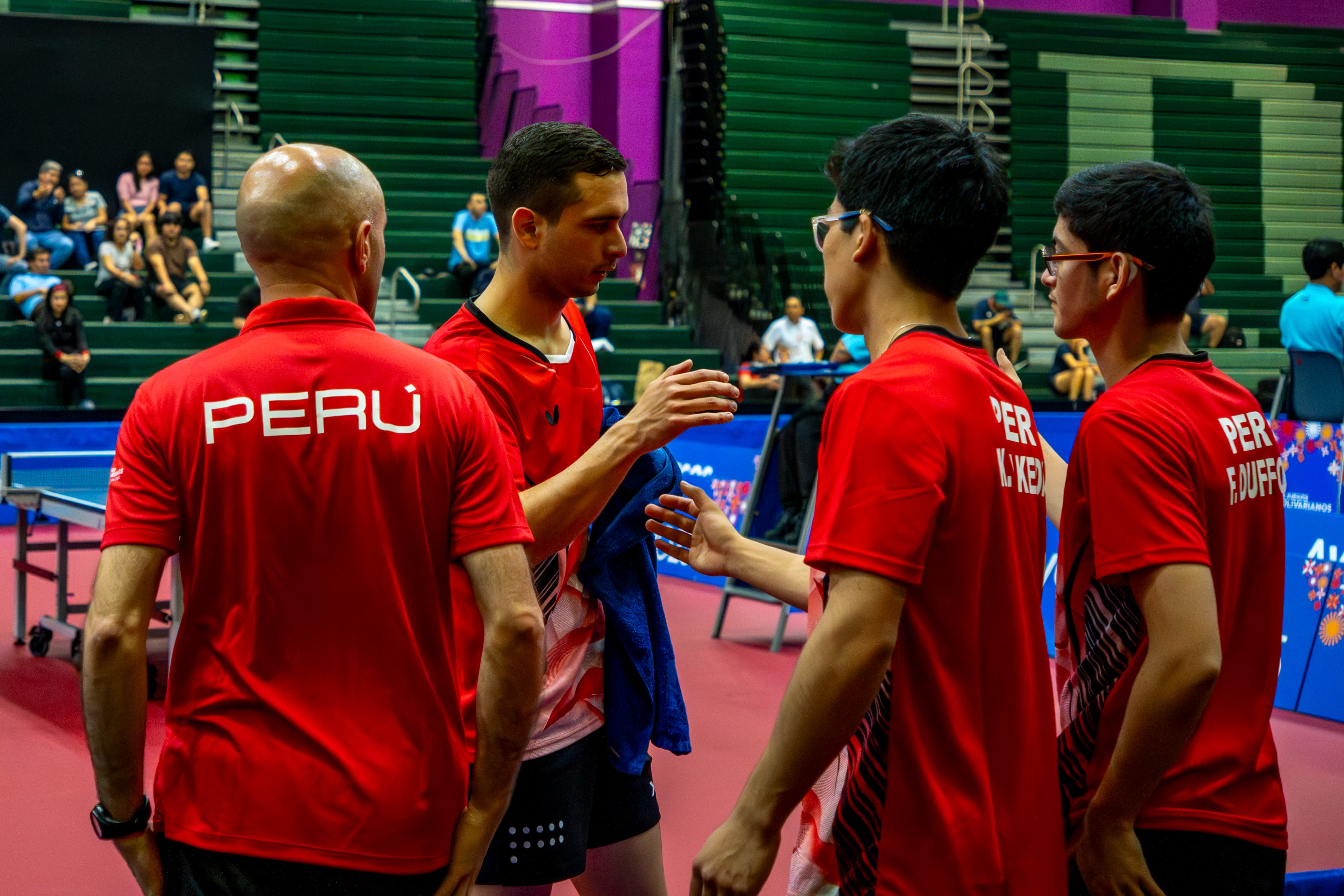 Peru national table tennis team with coach Francisco Santos at the Bolivarian Games