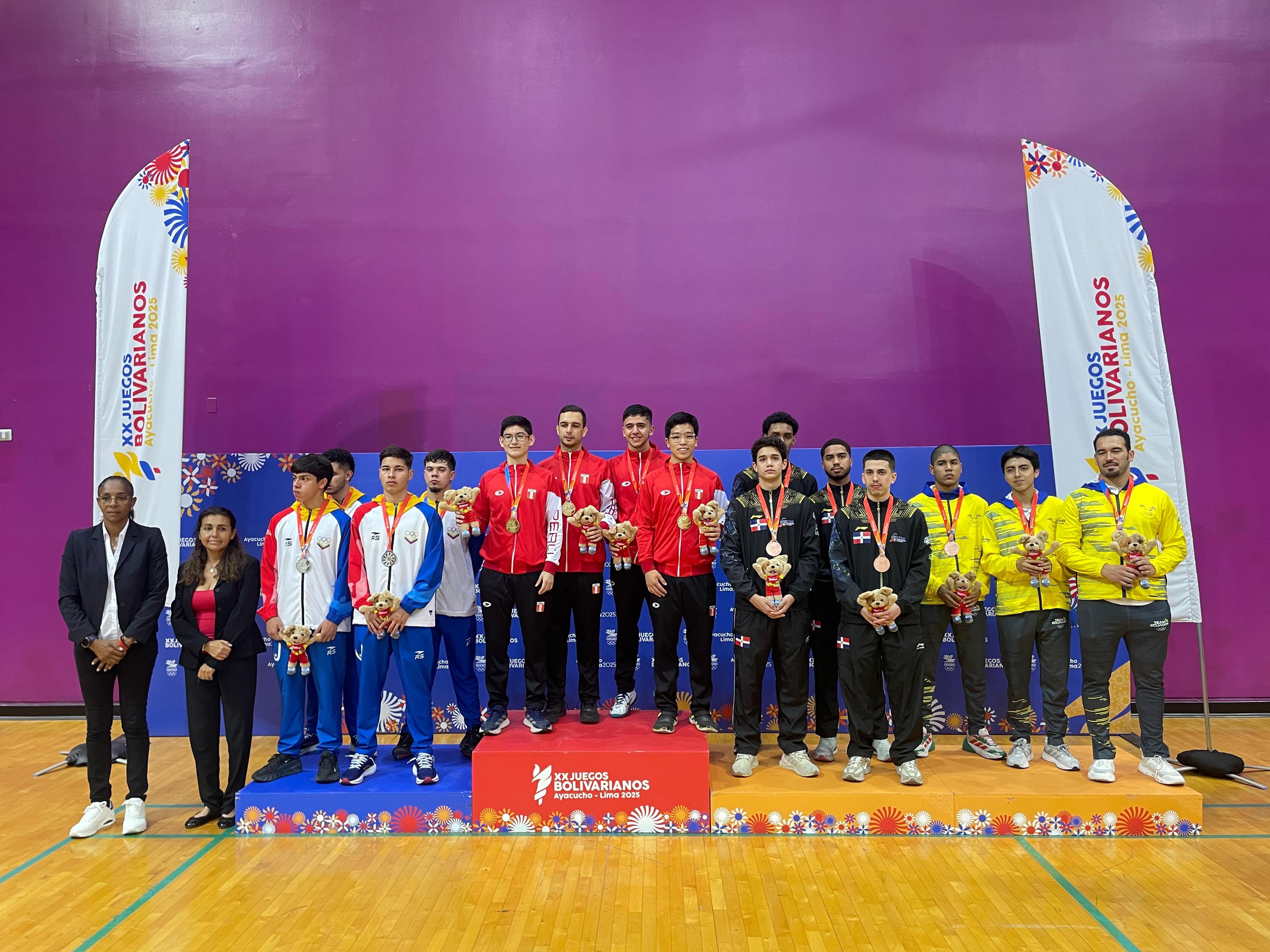 Peru's table tennis team on the podium at the Bolivarian Games
